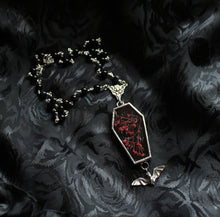 Load image into Gallery viewer, Floral Bat Coffin Necklace - Smoke, Red Baby&#39;s Breath, Marbled Onyx
